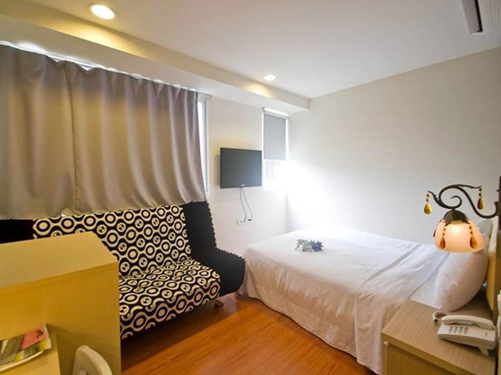 Green Park Commercial Hotel Tainan Oda fotoğraf